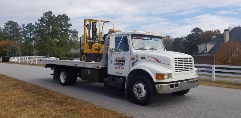Towing construction machinery 